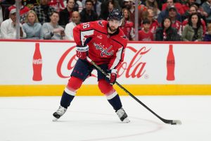 WASHINGTON, DC - NOVEMBER 07: Erik Gustafsson #56 of the Washington Capitals skates with the puck against the Edmonton Oilers during the second period at Capital One Arena on November 07, 2022 in Washington, DC. (Photo by Jess Rapfogel/Getty Images)