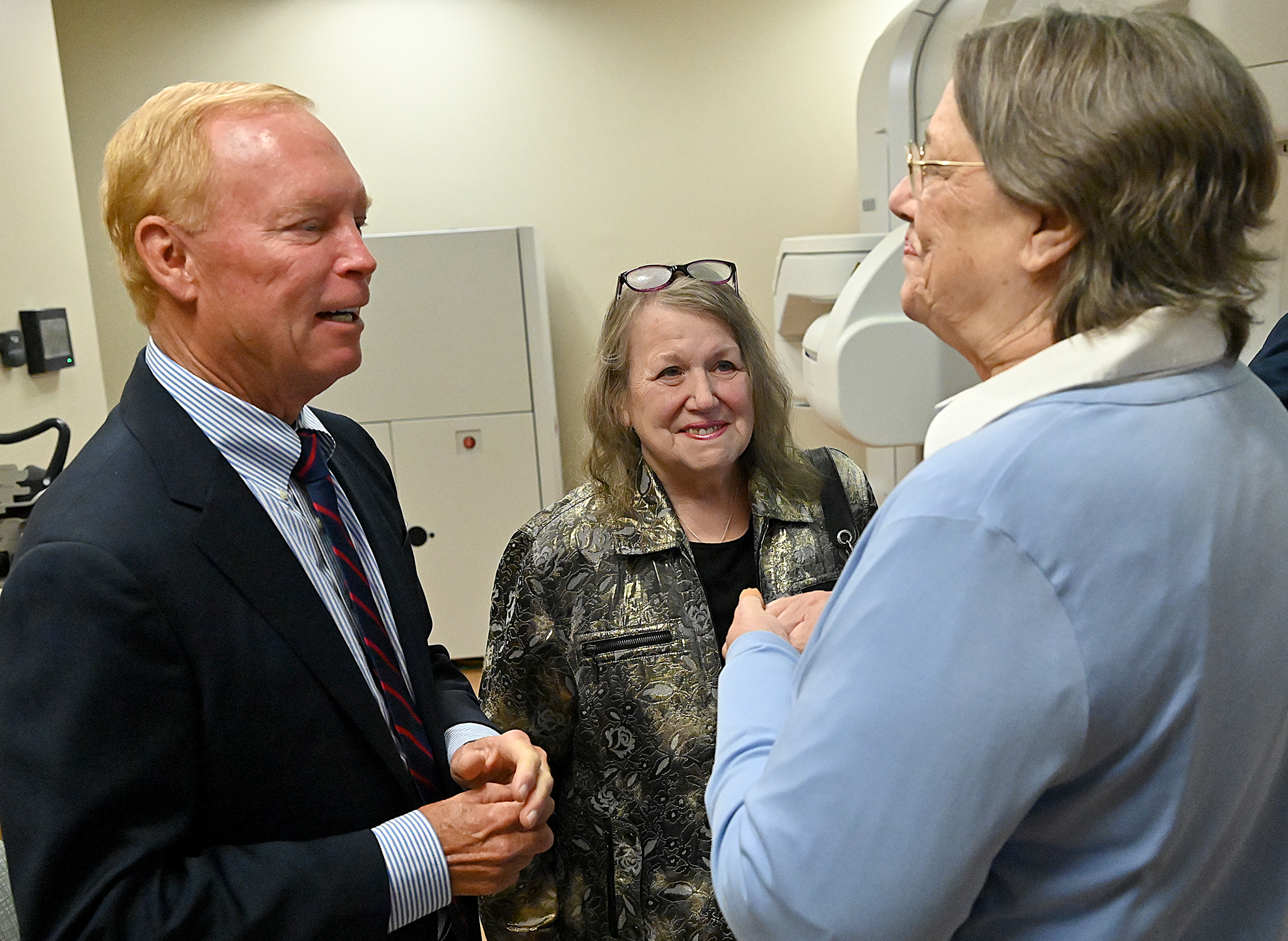 Cancer patient, Barbara Probst, thanks Greg Kahlert, president of the...