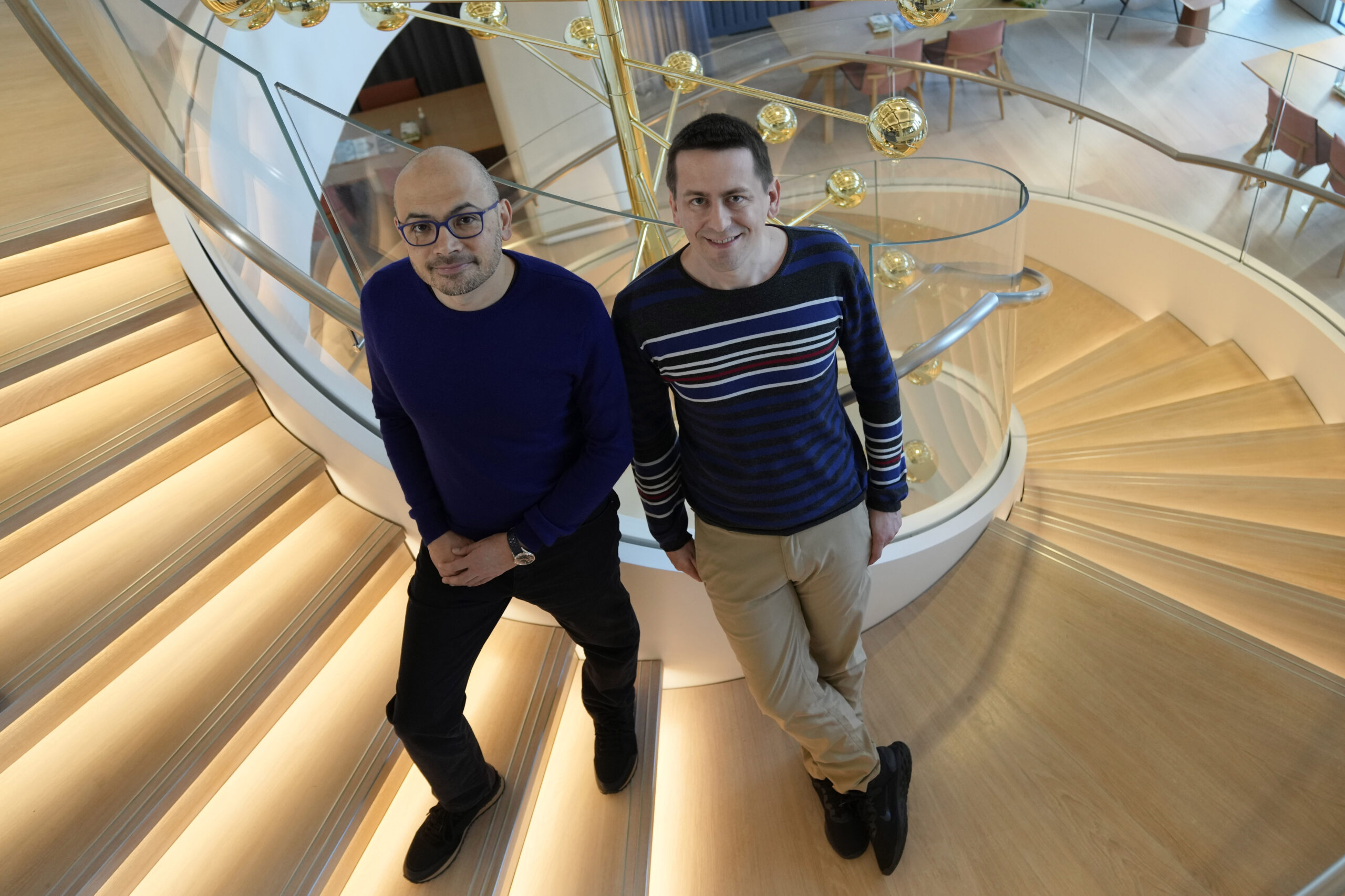 Researcher John Jumper, left, and Demis Hassabis, CEO of DeepMind...