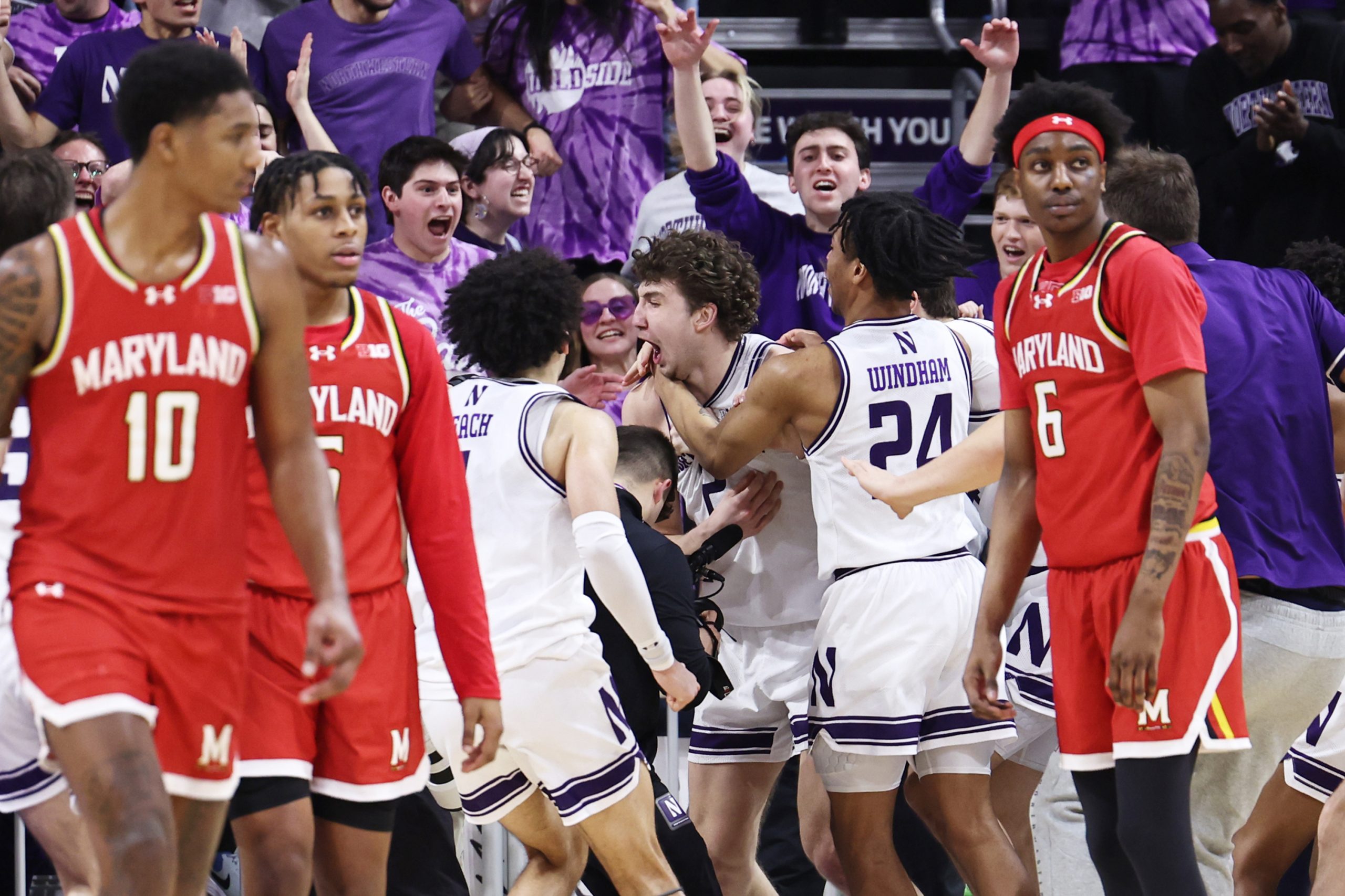 Northwestern's Nick Martinelli celebrates after hitting the game-winning shot in...