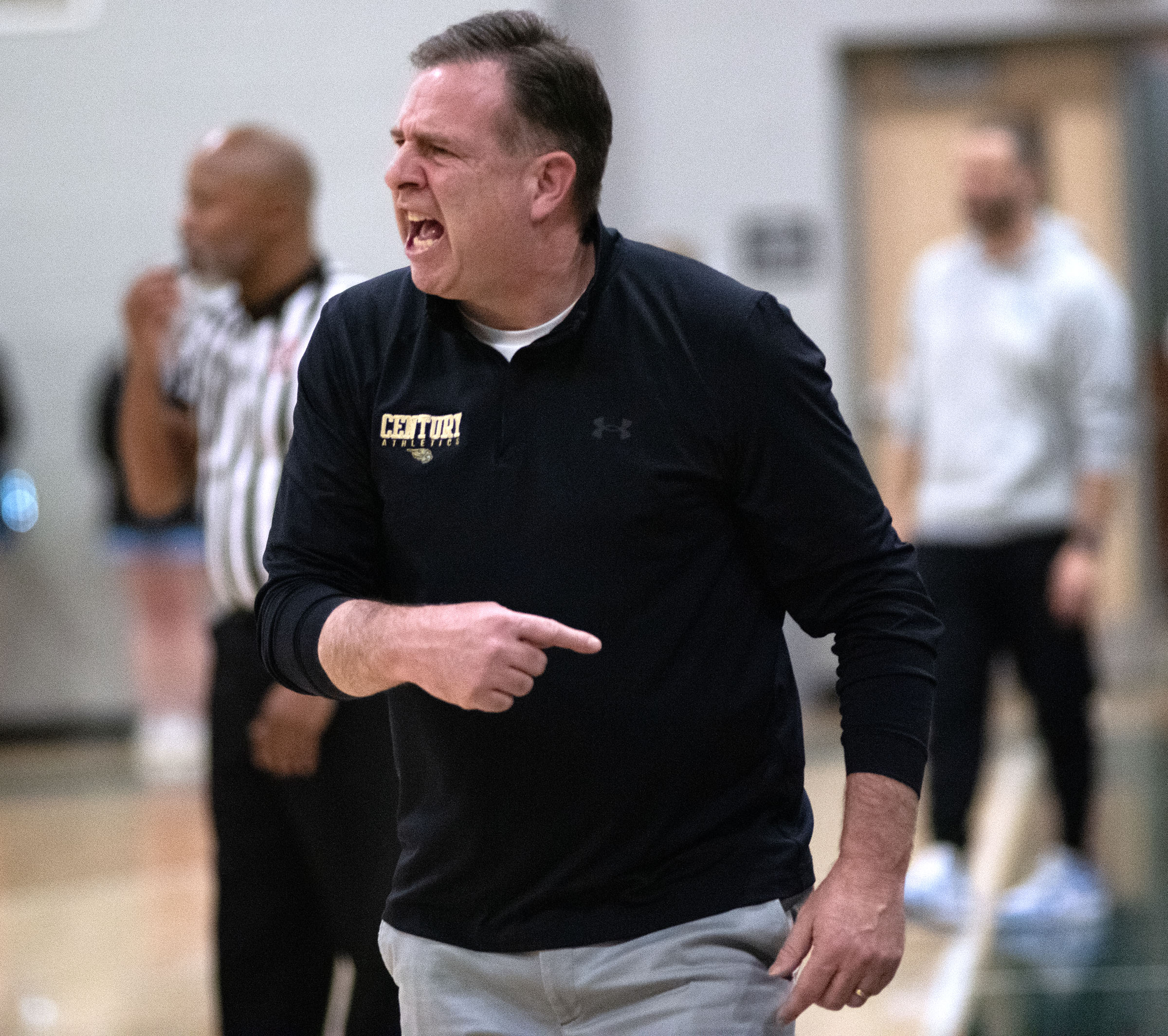 Jan. 14, 2025- Century boys basketball head coach George Wunder...