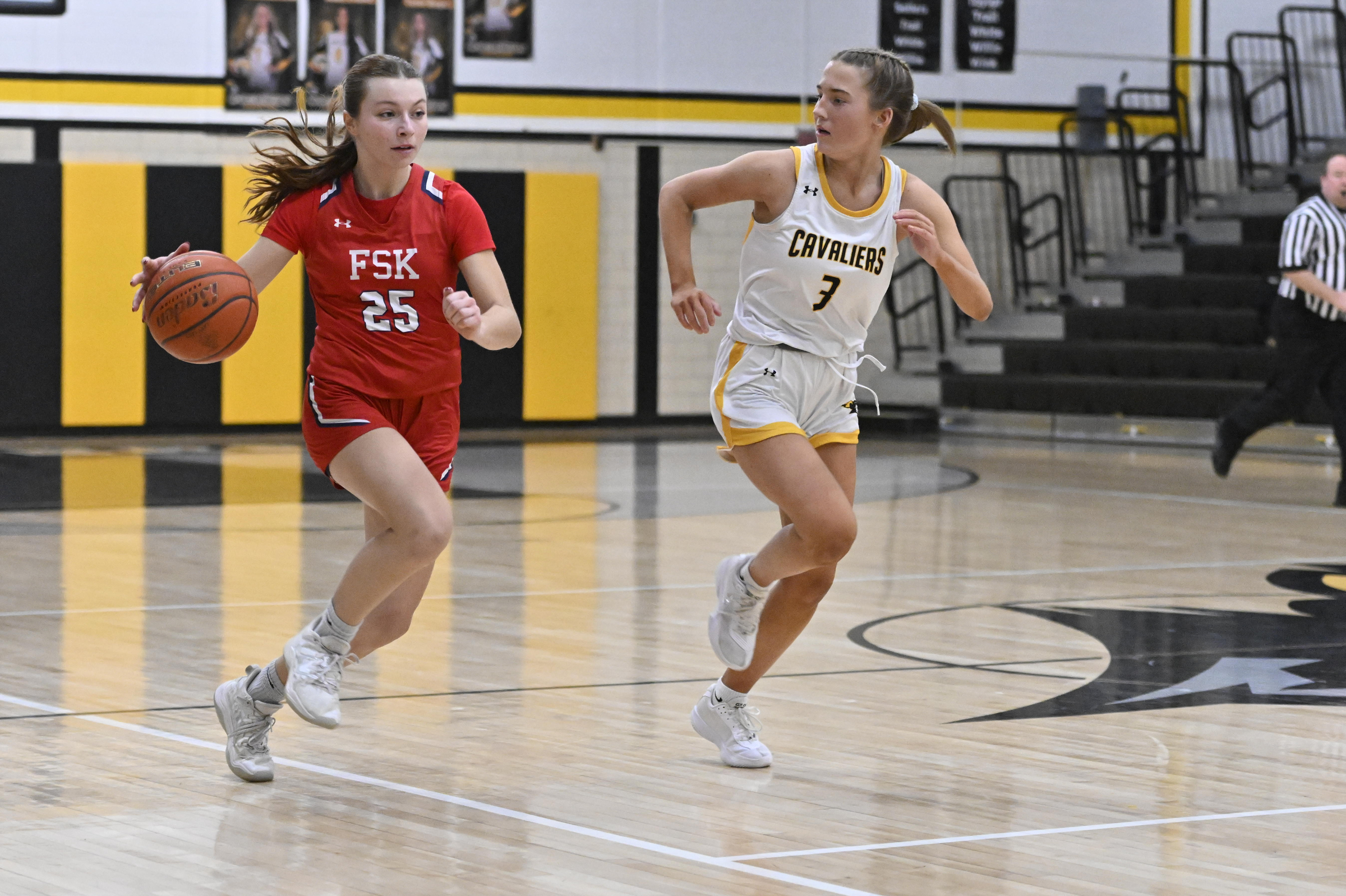 Francis Scott Key's McKenna Lanza brings the ball up court...