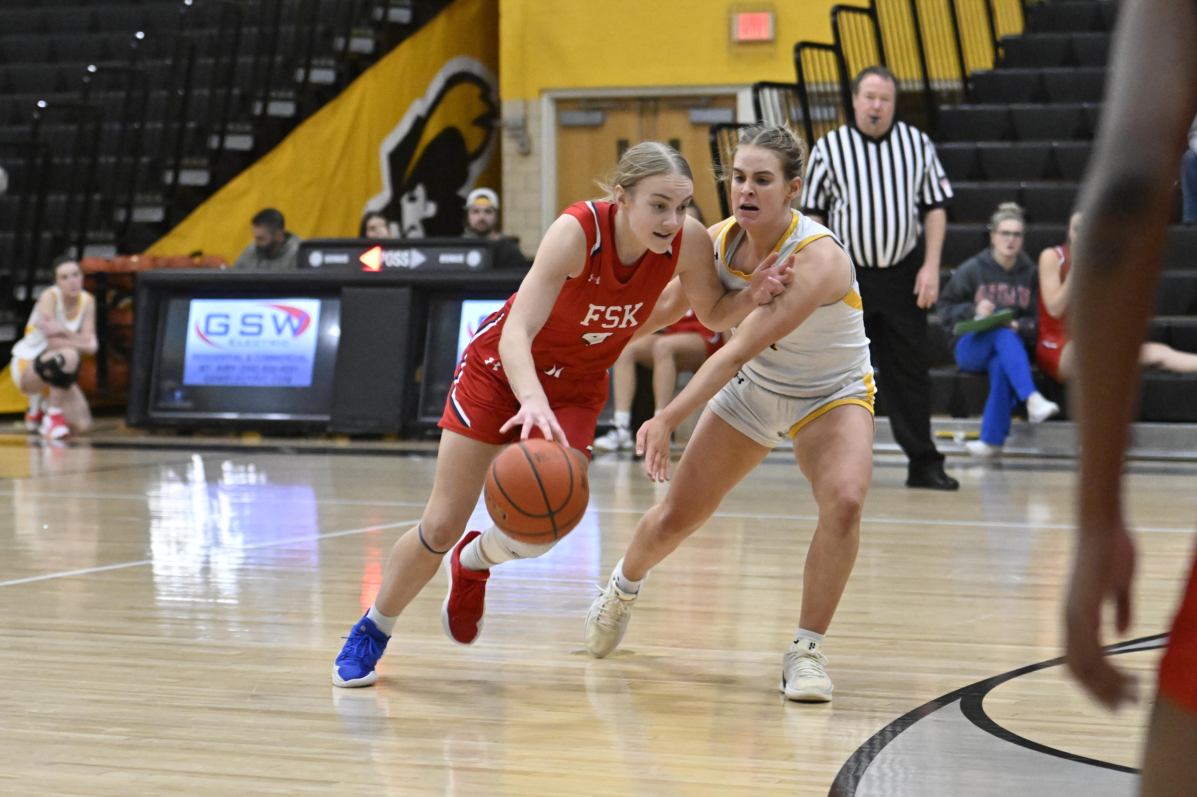 Francis Scott Key's Summer Brooks drives the ball past Charlotte...