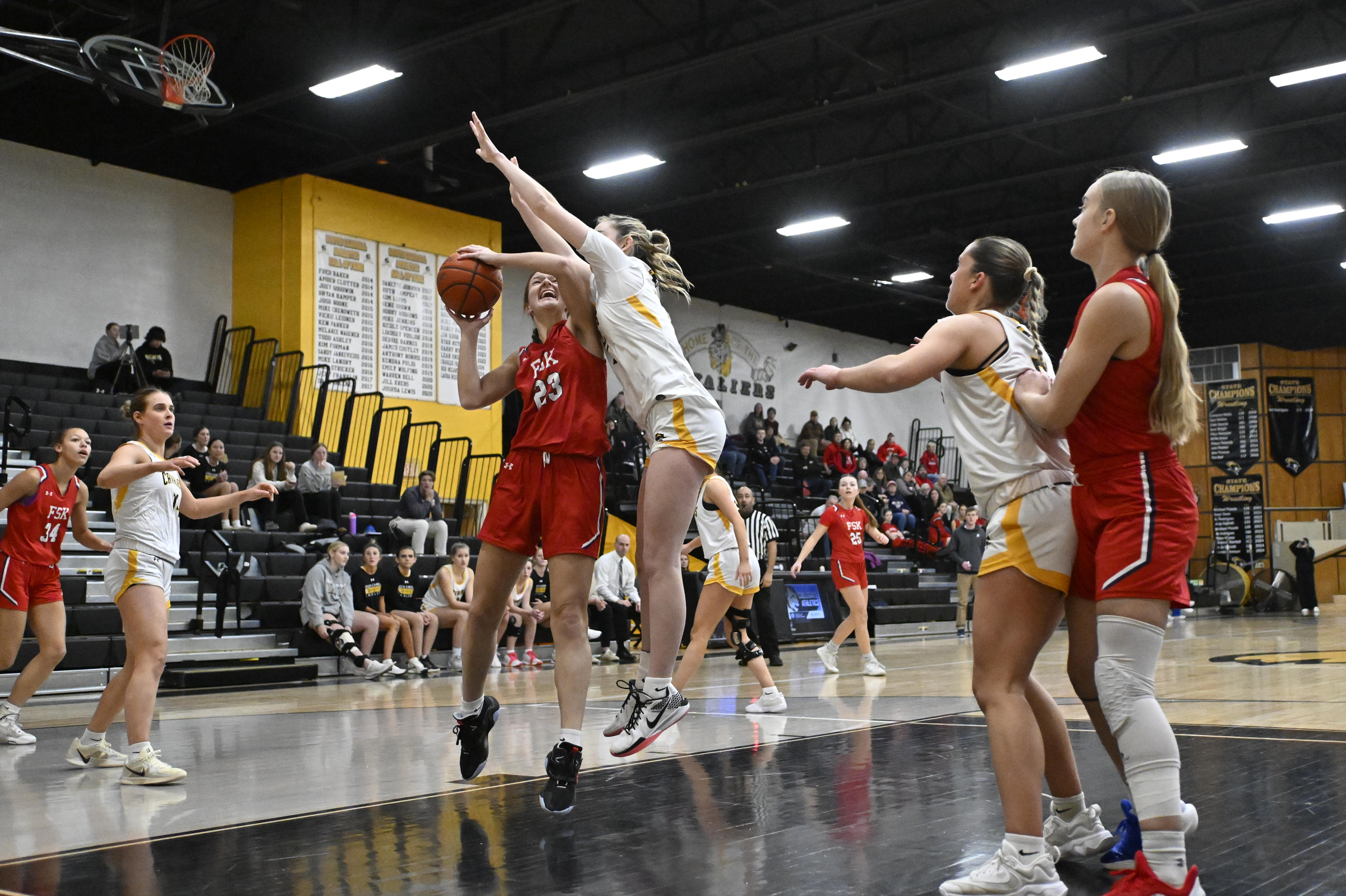 Francis Scott Key's Caroline Kohr drives for a basket as...