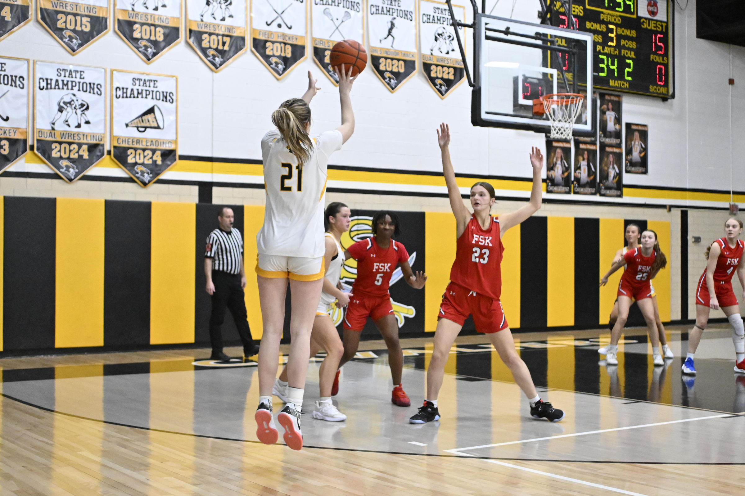 Jenna Todd shoots a three-pointer during a basketball game at...