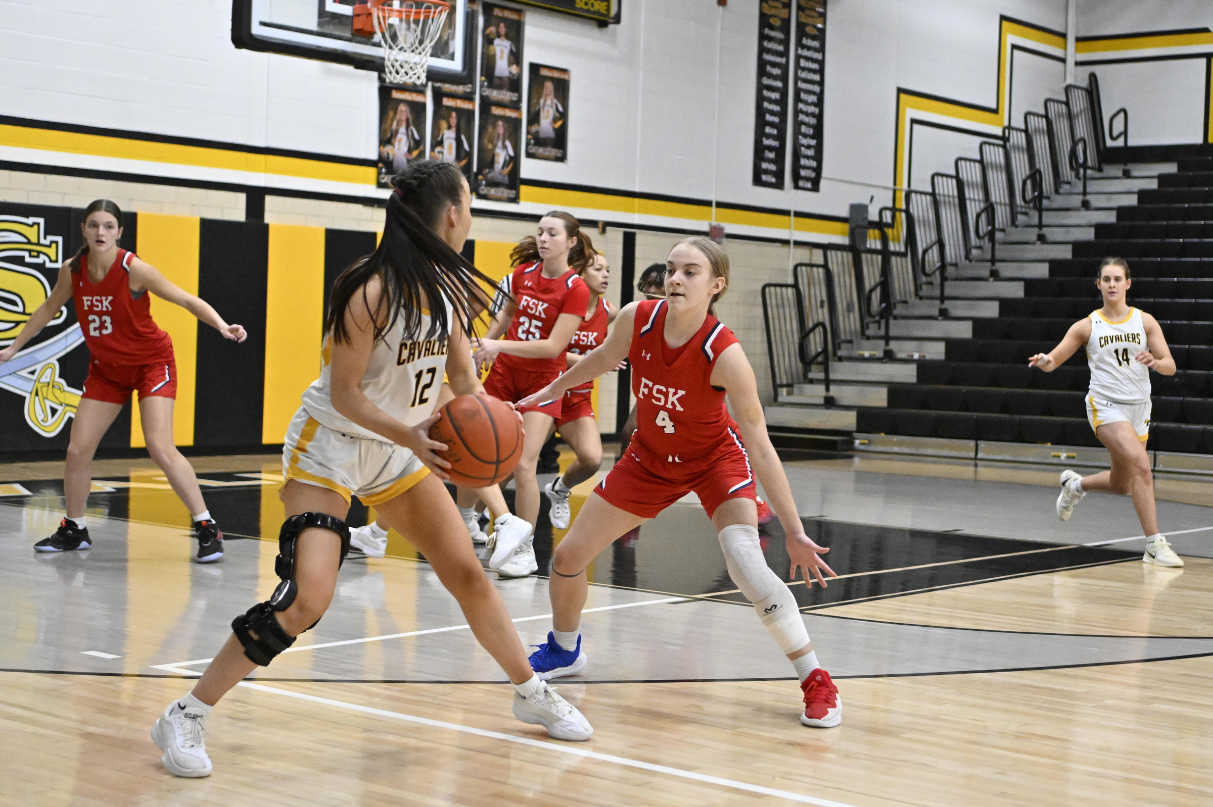 Francis Scott Key's Summer Brooks guards Caden Curtin during a...