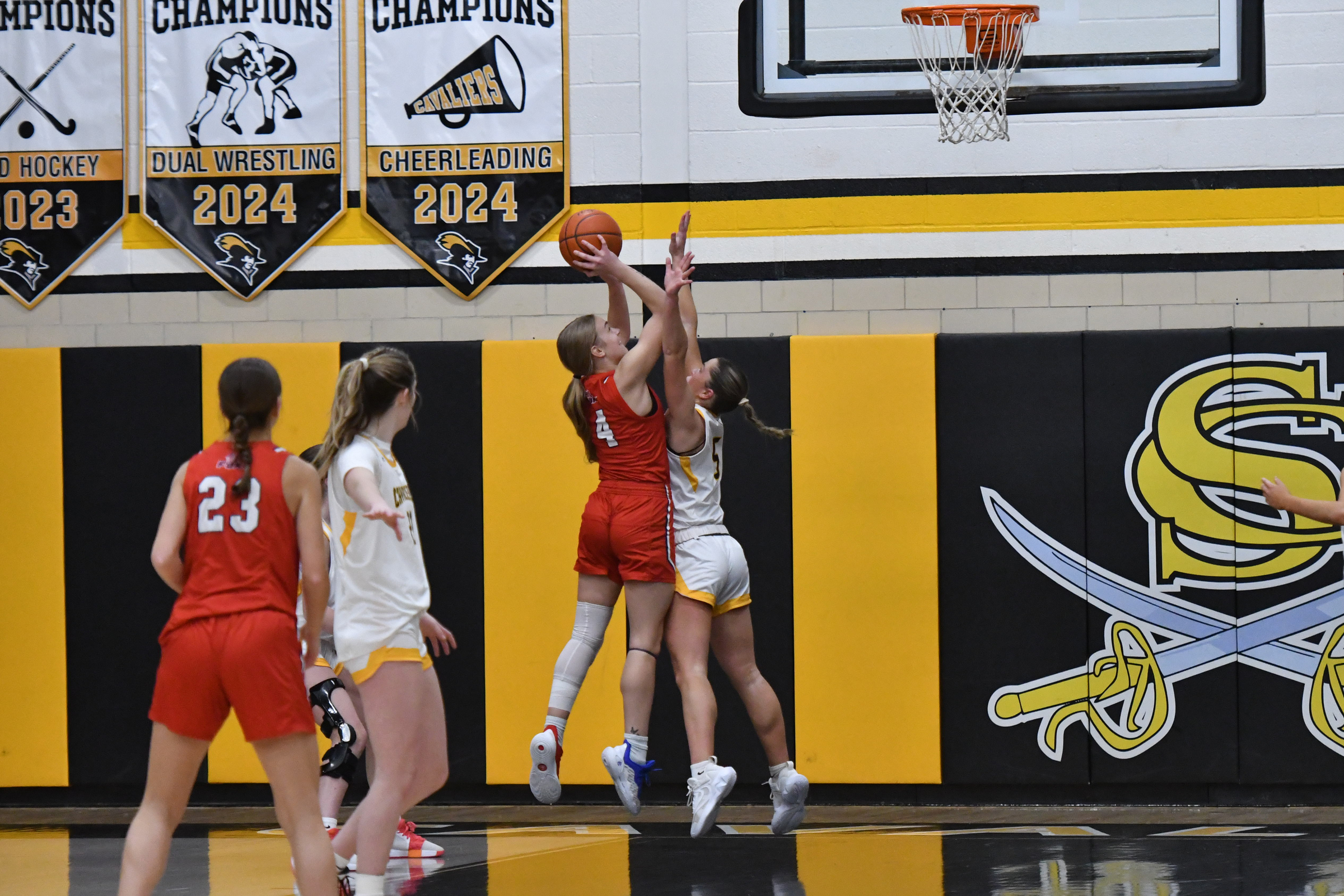 Francis Scott Key's Summer Brooks shoots the ball over Leah...