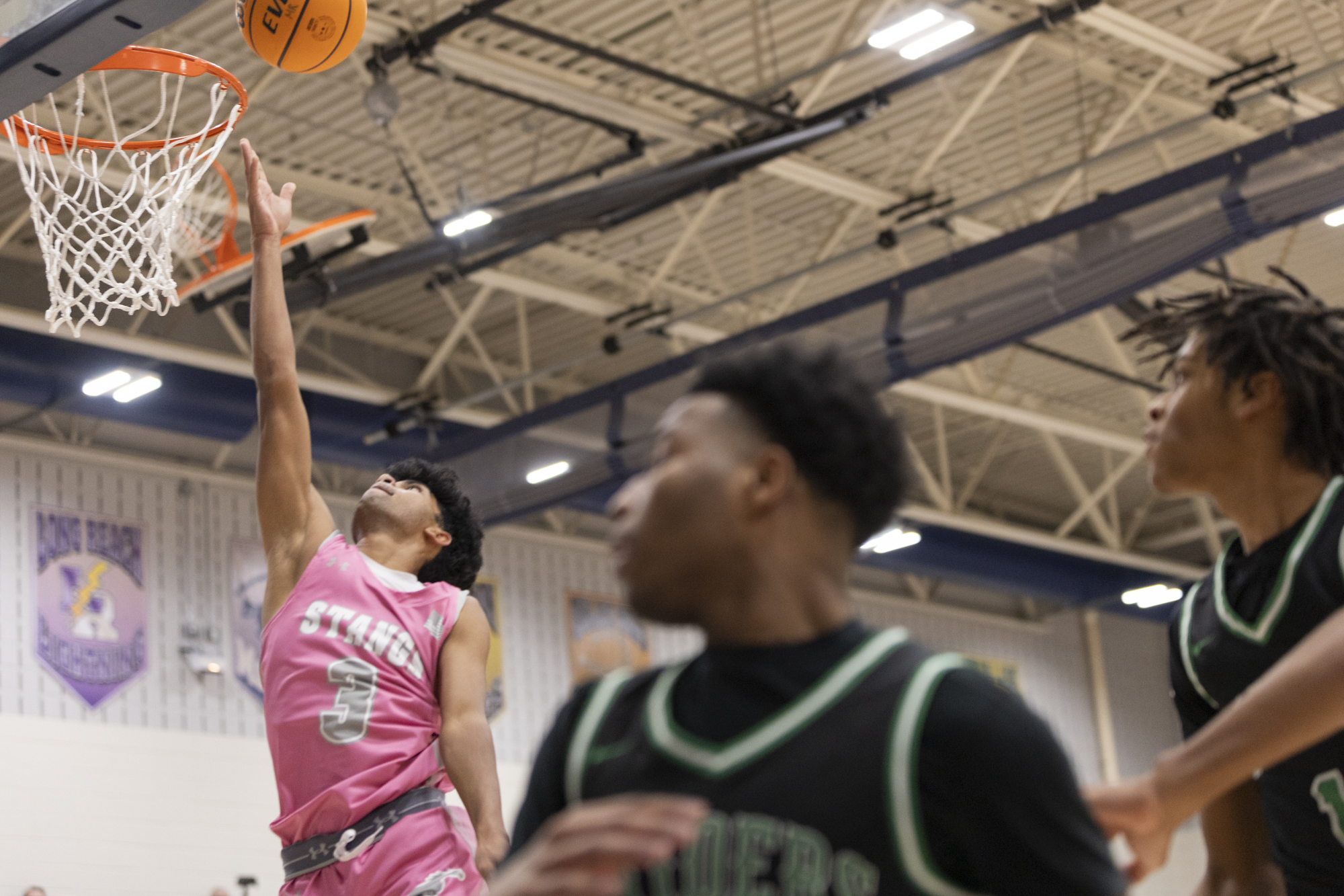 Rahul Jampan leaves the Atholton defense behind after maneuvering through...