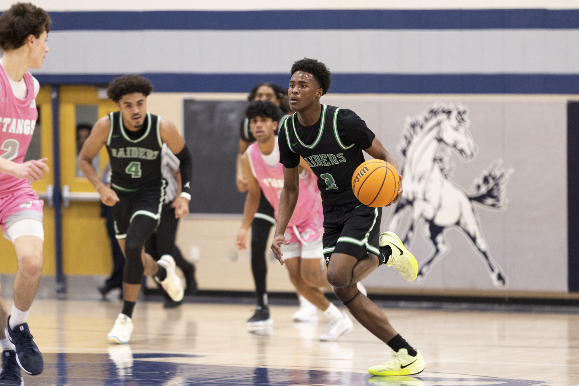 Atholton’s Demarcus Lamot carries the ball down the court during...