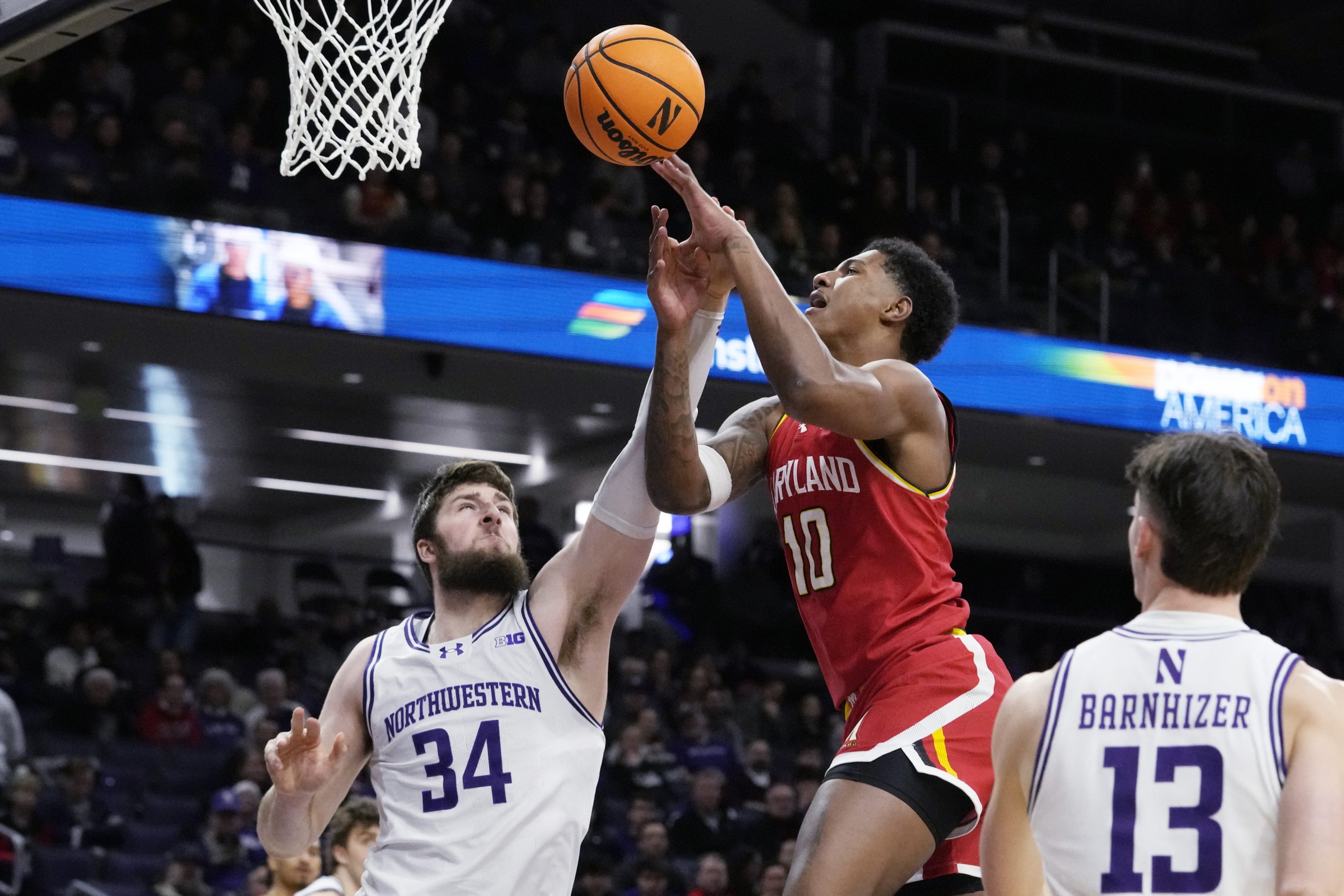 Maryland forward Julian Reese (10) drives to the basket against...