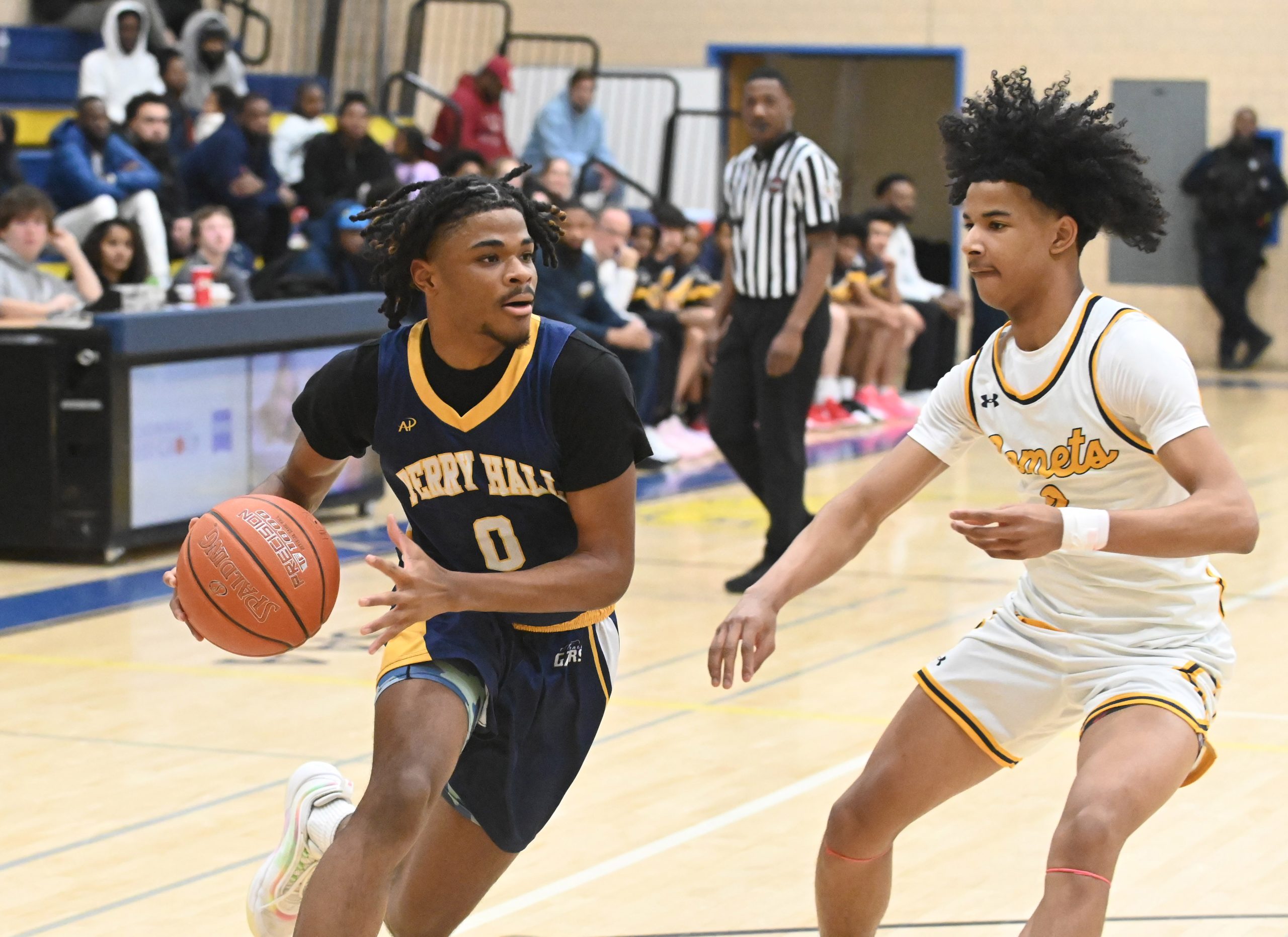 Perry Hall's Alexander Rice makes a move to the hoop...