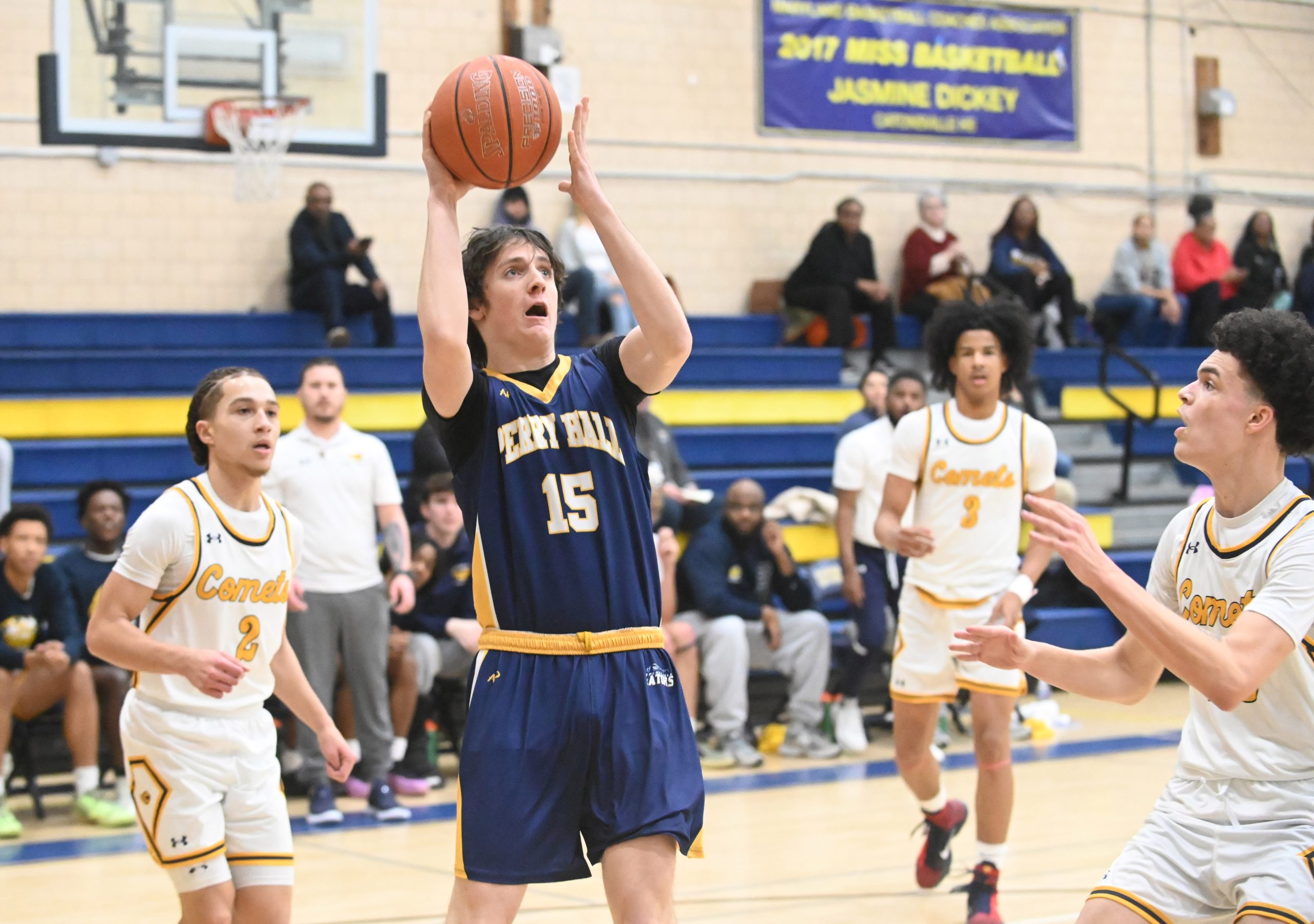 Perry Hall's Adam Butz makes a move to the hoop...