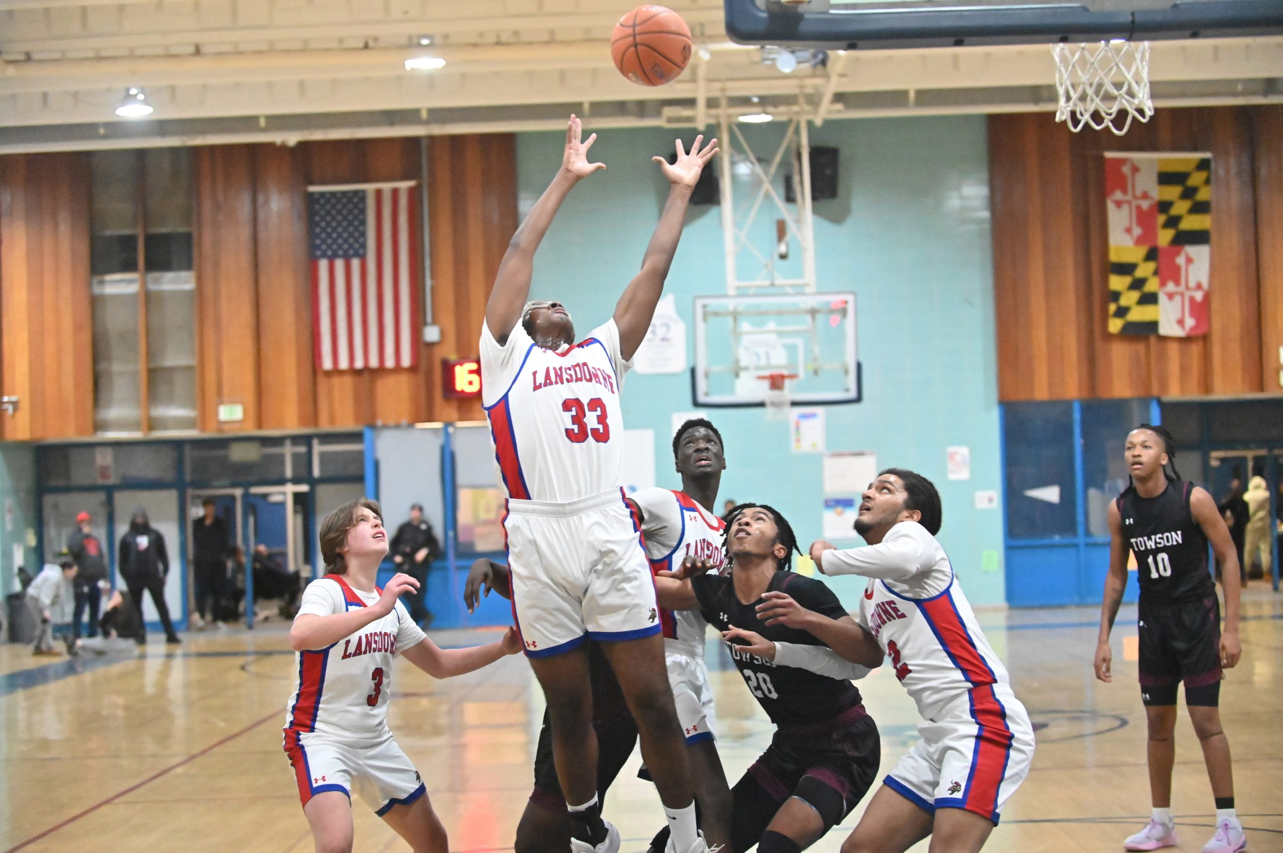 Lansdowne's Josh Rogers goes up to pull down a rebound...