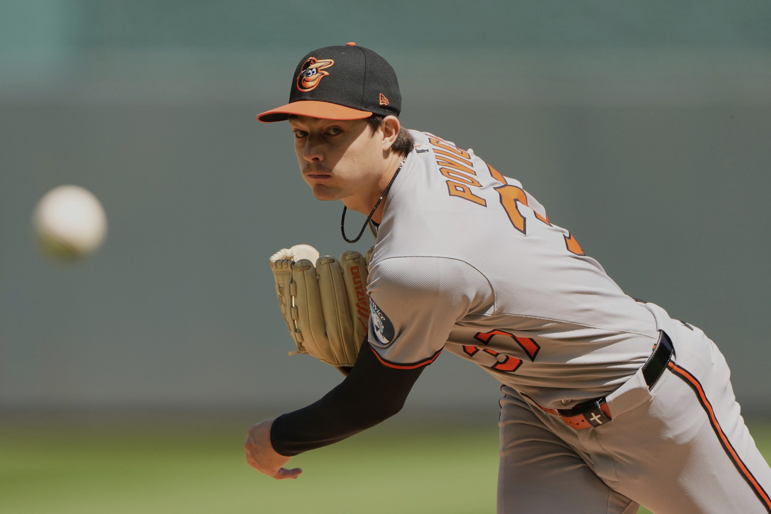 Baltimore Orioles starting pitcher Cade Povich throws during the first...